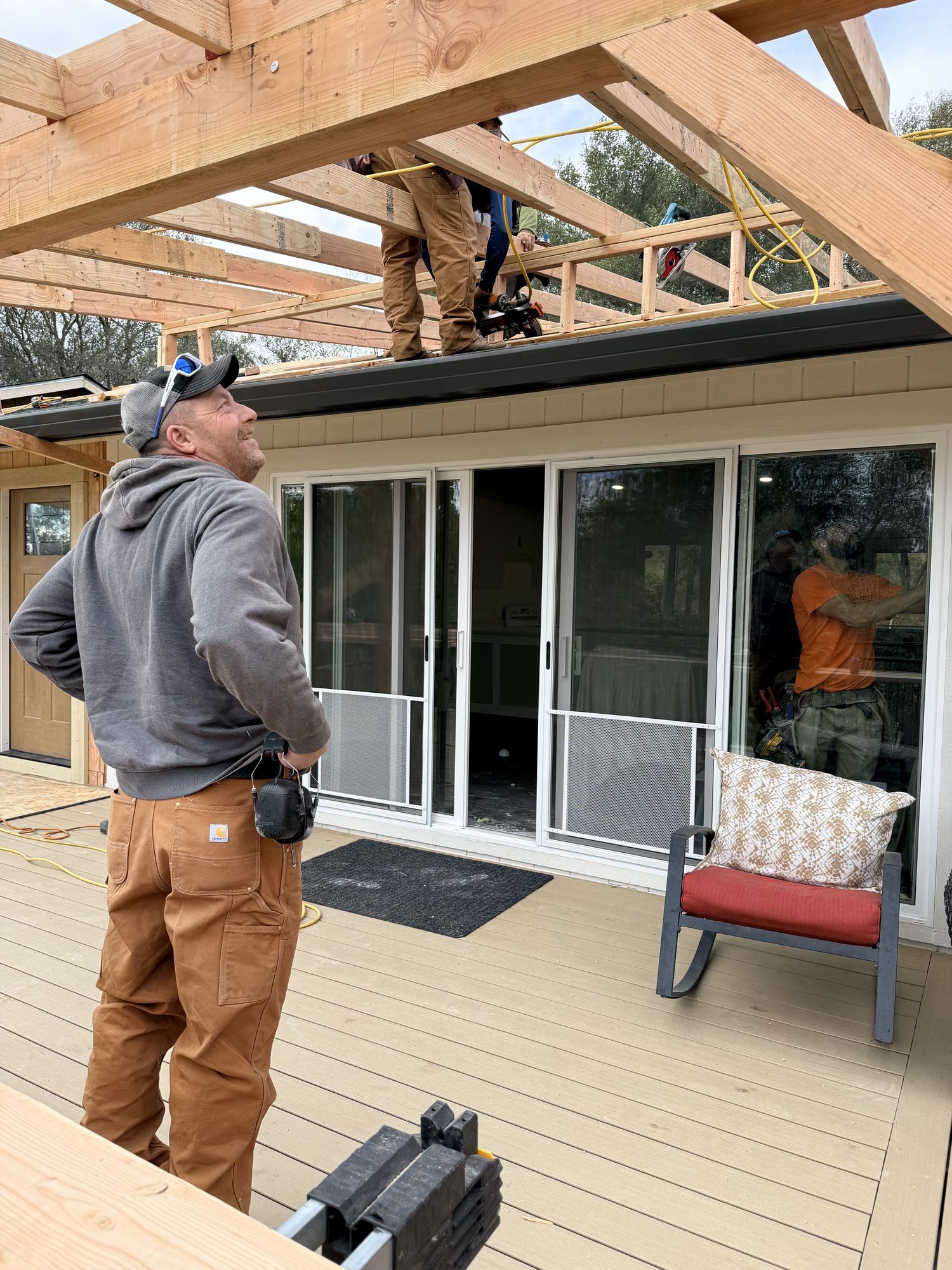 Chip Paynter overseeing his crew framing a patio cover