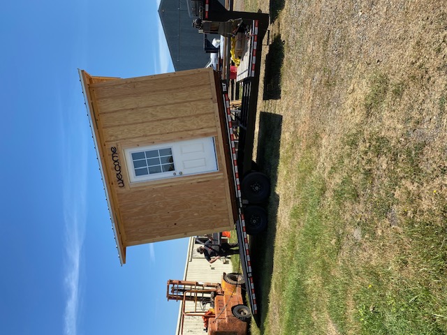 Completed shed loaded on trailer, ready for delivery