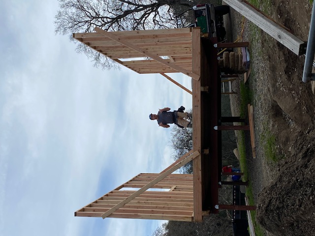 ADU wall framing with crew on platform