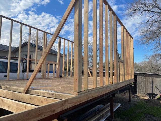 ADU wall framing against blue sky